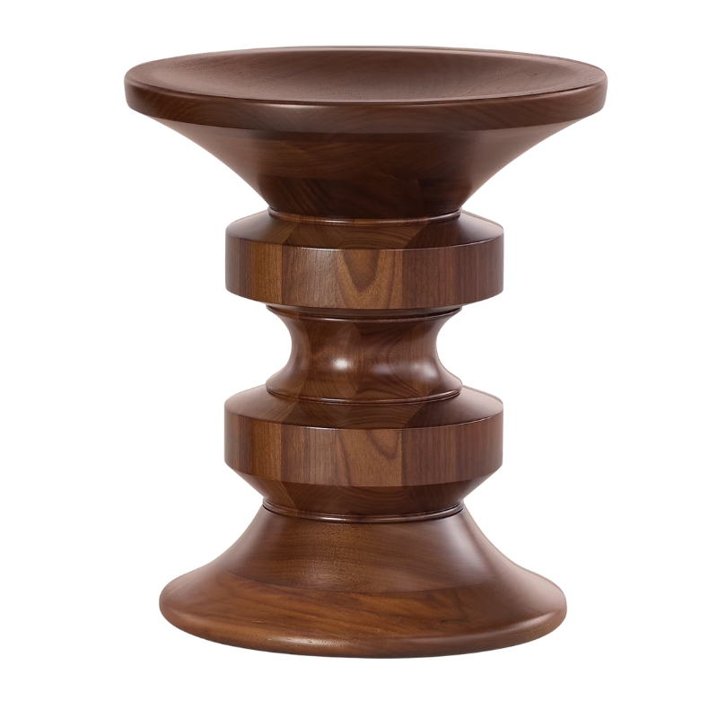 The Eames Turned Stool from Herman Miller made of walnut in shape D.