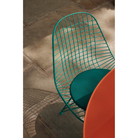 The Eames Wire Chair from Herman Miller, designed by Herman Miller x HAY with a seat pad close up.