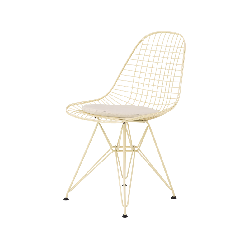 The Eames Wire Chair from Herman Miller, designed by Herman Miller x HAY in powder yellow with the seat pad option.