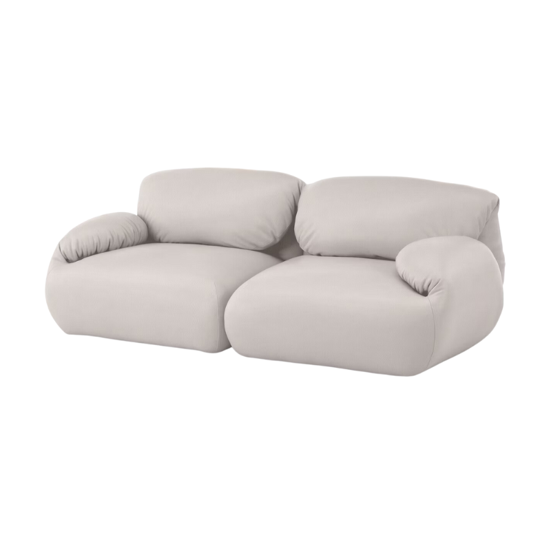 The two seater Luva Modular Sofa from Herman Miller with creme raise leather.