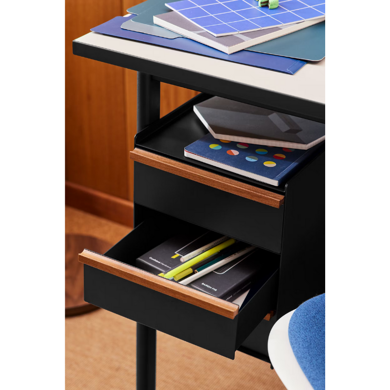The Mode Desk from Herman Miller being used as storage with the photograph focusing on the drawers.