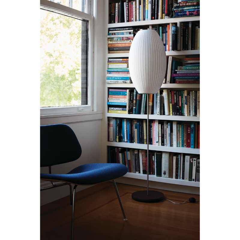 The Nelson Cigar Lotus Floor Light from Herman Miller in a family space.