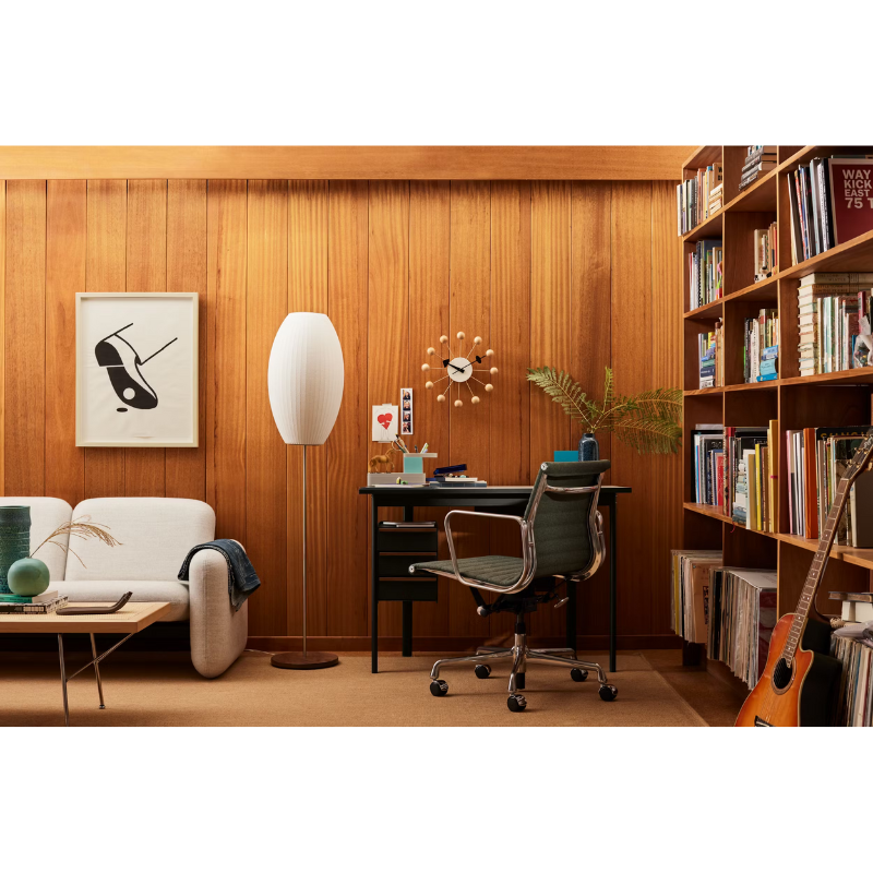 The Nelson Cigar Lotus Floor Light from Herman Miller in a home office.