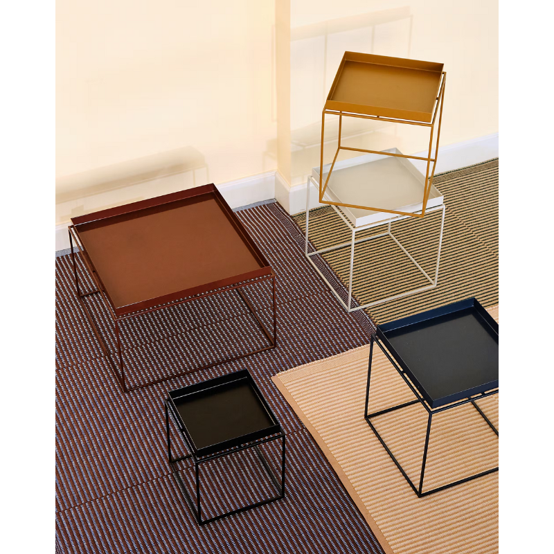 All three size variations (small, medium and large) and five color variations (matte black, matte white, matte toffee, glossy deep blue and glossy chocolate) in a lifestyle photograph.