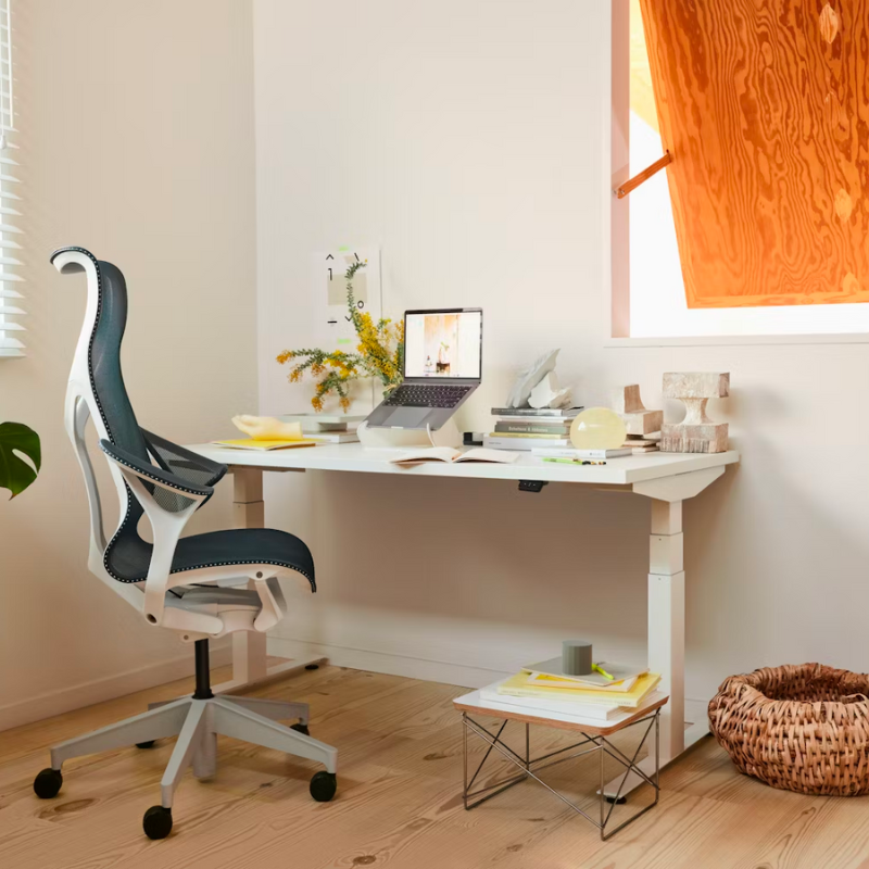Just 10 inches high, the Eames Wire Base Low Table (1950) provides a handy surface for books or a bedside lamp. The beveled edges of the top of this Eames side table reveal seven layers of sturdy birch plywood. Portable and lightweight, these low wire base tables can be stacked for storage or grouped to form a larger surface. This is the authentic Wire Base Low Table produced by Herman Miller. Eames is a licensed trademark of Herman Miller.