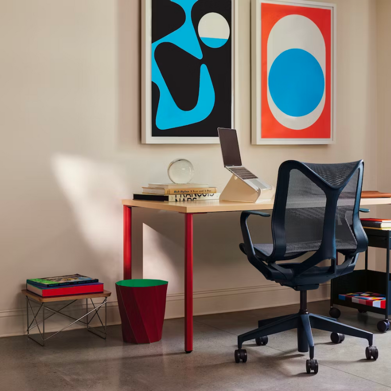 Just 10 inches high, the Eames Wire Base Low Table (1950) provides a handy surface for books or a bedside lamp. The beveled edges of the top of this Eames side table reveal seven layers of sturdy birch plywood. Portable and lightweight, these low wire base tables can be stacked for storage or grouped to form a larger surface. This is the authentic Wire Base Low Table produced by Herman Miller. Eames is a licensed trademark of Herman Miller.