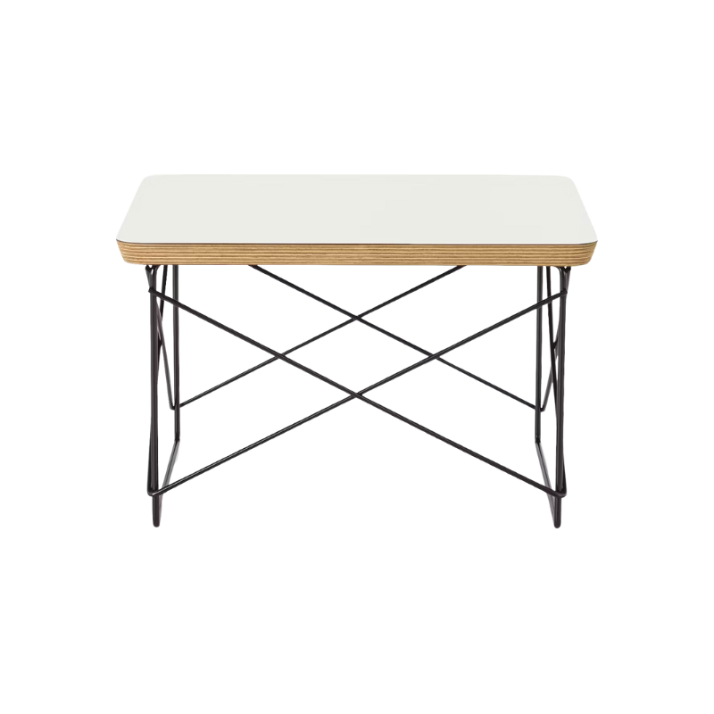 Just 10 inches high, the Eames Wire Base Low Table (1950) provides a handy surface for books or a bedside lamp. The beveled edges of the top of this Eames side table reveal seven layers of sturdy birch plywood. Portable and lightweight, these low wire base tables can be stacked for storage or grouped to form a larger surface. This is the authentic Wire Base Low Table produced by Herman Miller. Eames is a licensed trademark of Herman Miller.