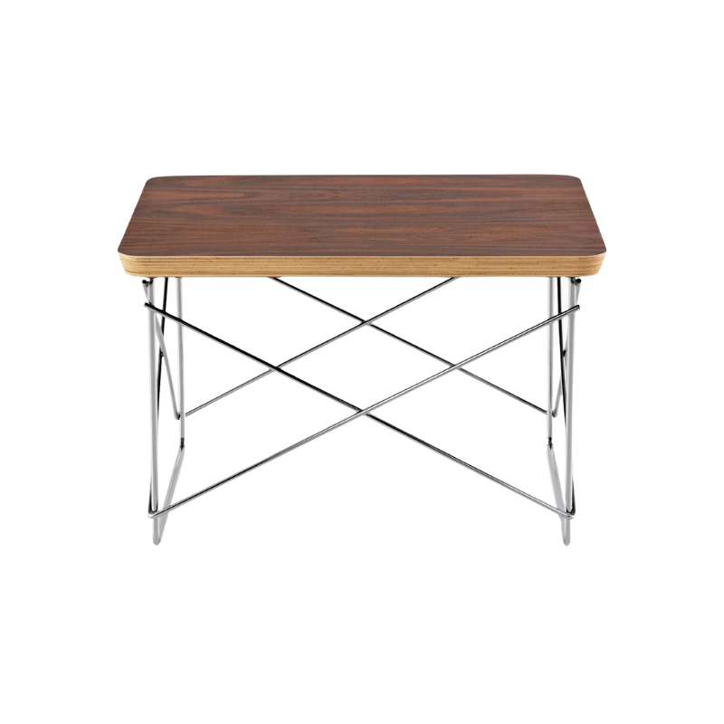 Just 10 inches high, the Eames Wire Base Low Table (1950) provides a handy surface for books or a bedside lamp. The beveled edges of the top of this Eames side table reveal seven layers of sturdy birch plywood. Portable and lightweight, these low wire base tables can be stacked for storage or grouped to form a larger surface. This is the authentic Wire Base Low Table produced by Herman Miller. Eames is a licensed trademark of Herman Miller.