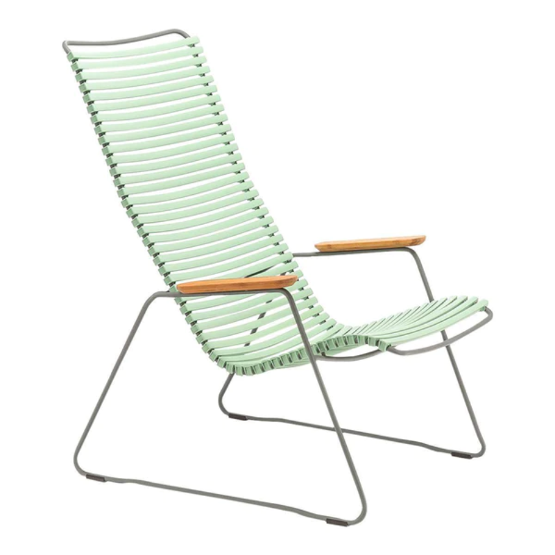 The CLICK outdoor lounge chair is an extension of the CLICK Rocking chair, offering the same level of comfort. It features lamellas with the right resilience for cushion-free comfort. These lamellas can be easily clicked on and off, allowing you to modify the chair's look by changing or mixing different colors. The CLICK Lounge chair is available in 13 colors, providing plenty of options for customization.
