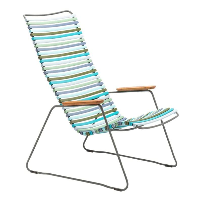 The CLICK outdoor lounge chair is an extension of the CLICK Rocking chair, offering the same level of comfort. It features lamellas with the right resilience for cushion-free comfort. These lamellas can be easily clicked on and off, allowing you to modify the chair's look by changing or mixing different colors. The CLICK Lounge chair is available in 13 colors, providing plenty of options for customization.