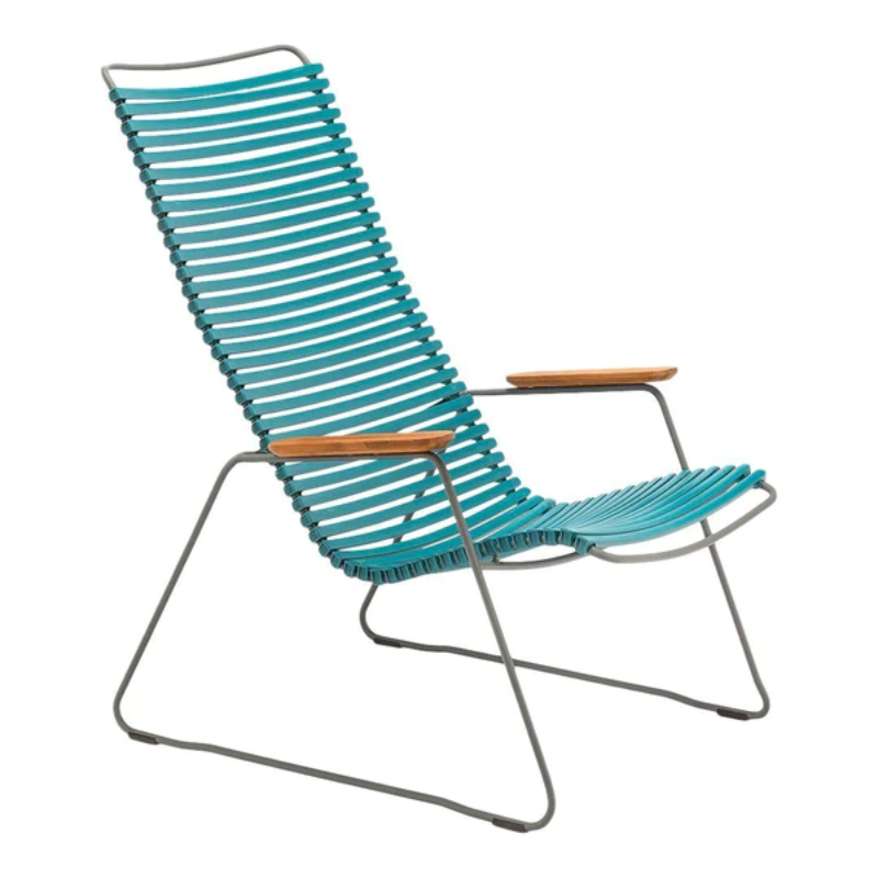 The CLICK outdoor lounge chair is an extension of the CLICK Rocking chair, offering the same level of comfort. It features lamellas with the right resilience for cushion-free comfort. These lamellas can be easily clicked on and off, allowing you to modify the chair's look by changing or mixing different colors. The CLICK Lounge chair is available in 13 colors, providing plenty of options for customization.