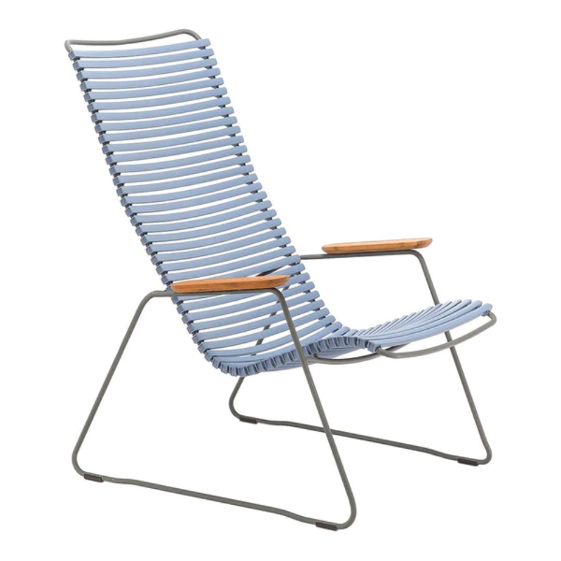 The CLICK outdoor lounge chair is an extension of the CLICK Rocking chair, offering the same level of comfort. It features lamellas with the right resilience for cushion-free comfort. These lamellas can be easily clicked on and off, allowing you to modify the chair's look by changing or mixing different colors. The CLICK Lounge chair is available in 13 colors, providing plenty of options for customization.
