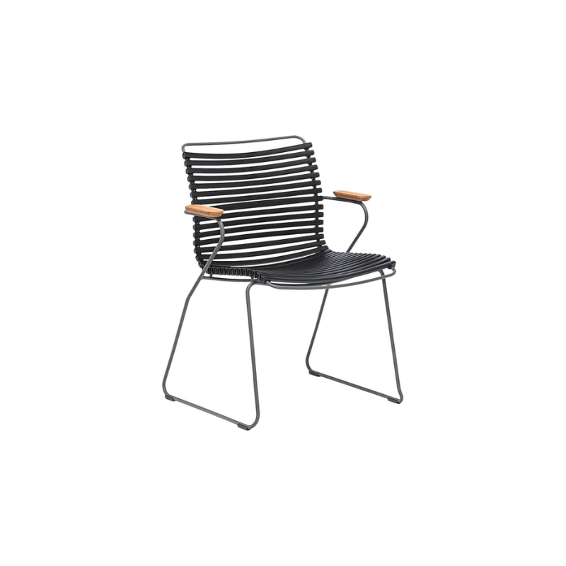 CLICK outdoor dining armchair is simple, honest, and ergonomically well thought out. It is beautiful in its repetition around the table and because the slats (lamellas) can be replaced, you can mix and change the colors as often as you like. These outdoor dining chairs are stackable and easy to store. 