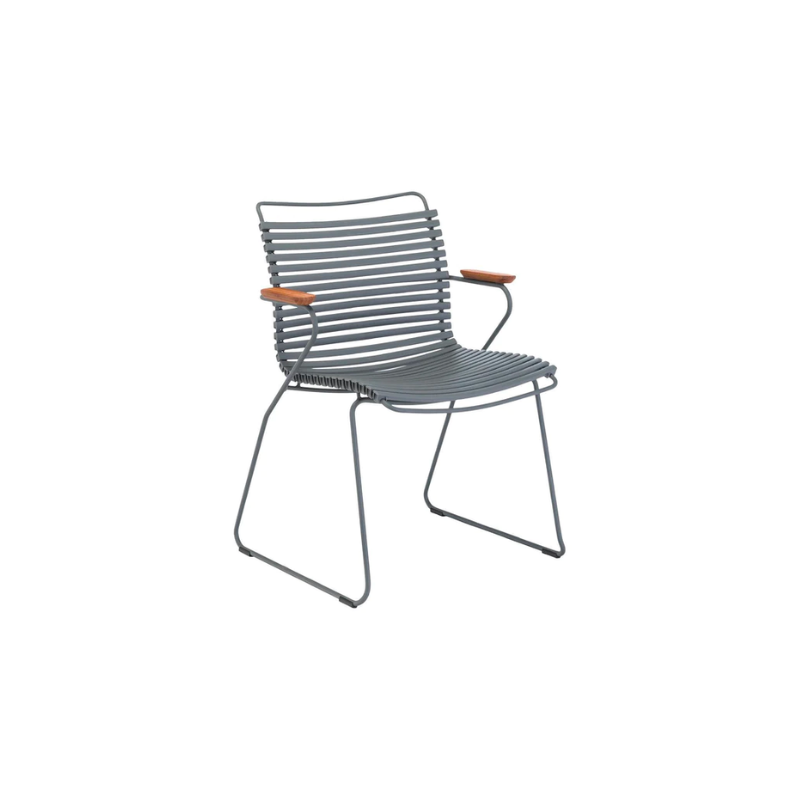 CLICK outdoor dining armchair is simple, honest, and ergonomically well thought out. It is beautiful in its repetition around the table and because the slats (lamellas) can be replaced, you can mix and change the colors as often as you like. These outdoor dining chairs are stackable and easy to store. 