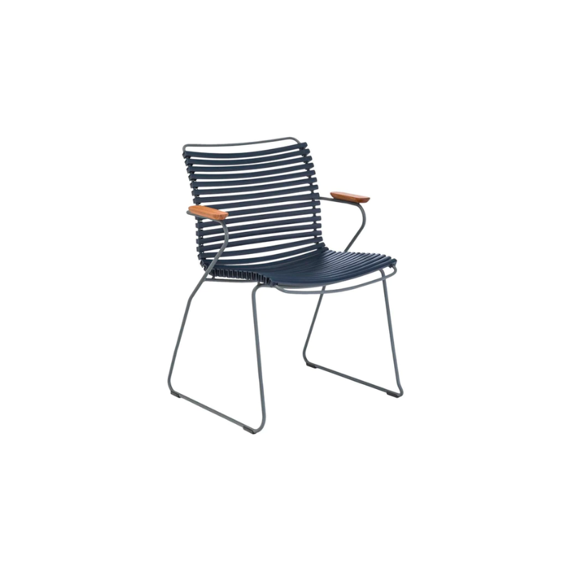 CLICK outdoor dining armchair is simple, honest, and ergonomically well thought out. It is beautiful in its repetition around the table and because the slats (lamellas) can be replaced, you can mix and change the colors as often as you like. These outdoor dining chairs are stackable and easy to store. 