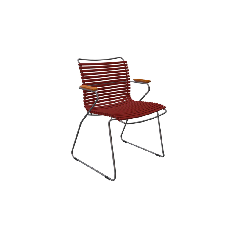 CLICK outdoor dining armchair is simple, honest, and ergonomically well thought out. It is beautiful in its repetition around the table and because the slats (lamellas) can be replaced, you can mix and change the colors as often as you like. These outdoor dining chairs are stackable and easy to store. 