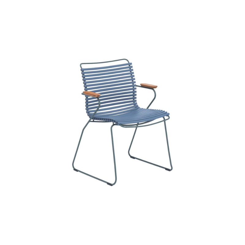 CLICK outdoor dining armchair is simple, honest, and ergonomically well thought out. It is beautiful in its repetition around the table and because the slats (lamellas) can be replaced, you can mix and change the colors as often as you like. These outdoor dining chairs are stackable and easy to store. 