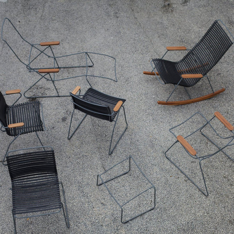 CLICK outdoor chair is simple, honest, and ergonomically well thought out. It is beautiful in its repetition around the table and because the slats (lamellas) can be replaced, you can mix and change the colors as often as you like. These outdoor dining chairs are stackable and easy to store. 