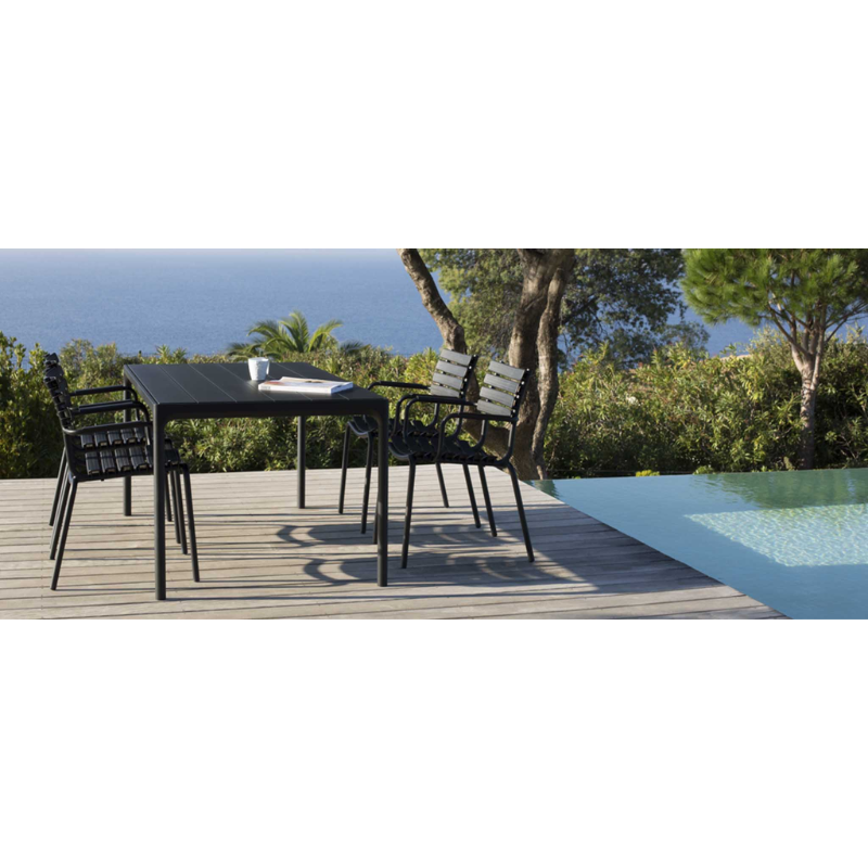 A dining table with a top and four legs – that is what you get in FOUR, no matter which size you choose. The special developed extruded profile in the table frame makes FOUR a remarkable strong table. FOUR in 4 different sizes with table top options in bamboo or black metal, with legs in powder coated black or grey aluminum.