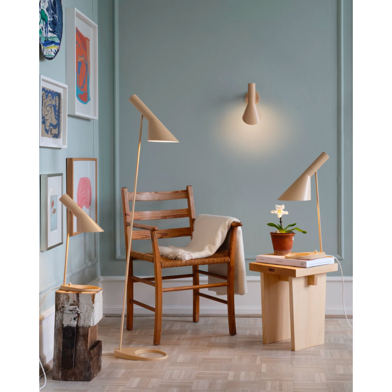 The AJ Floor Lamp designed by Arne Jacobsen for Louis Poulsen features a slim profile that fits in perfectly with every room. The fixture emits downward-directed light and the angle of the shade can be adjusted to optimize light distribution.