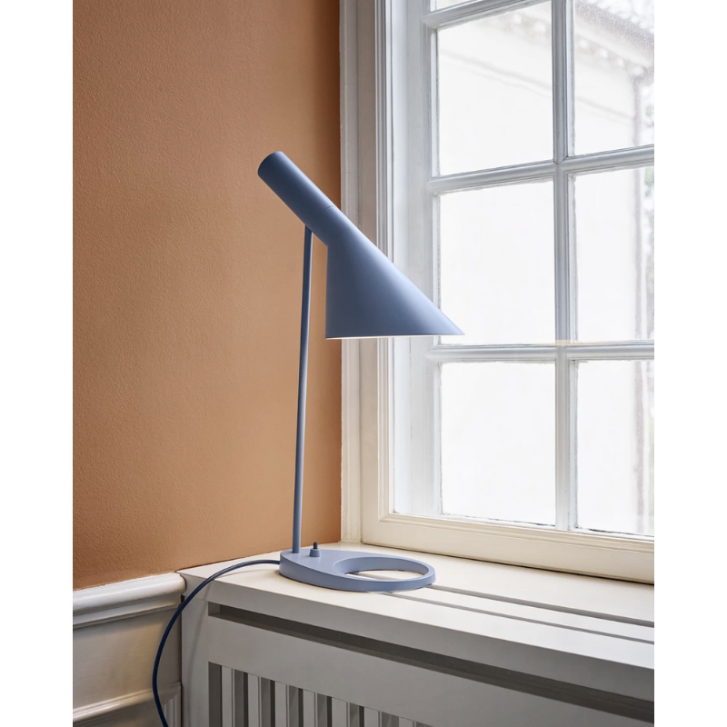 The fixture emits downward-directed light. The angle of the shade can be adjusted to optimize light distribution. The shade is painted white on the inside to ensure a soft comfortable light.