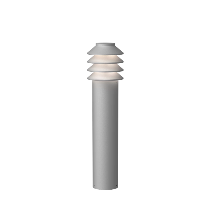Its downscaled design is based on the same concept as the original Bysted. Four rings redirect the light downward while glowing at night and giving the product individuality and character. 