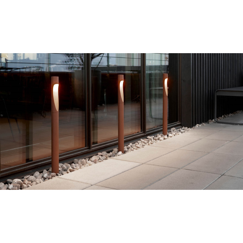 The Flindt Garden Bollard, crafted by renowned Danish designer Christian Flindt with Louis Poulsen, offers premier outdoor illumination for spaces like parks, courtyards, and gardens without sacrificing light quality or design. 