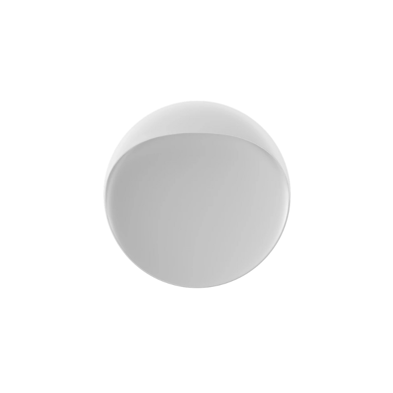 The Flindt Wall is distinguished by a light egress from an opening in the top that emits light down the front of the fixture, creating a subtle, glowing ring of reflected light on the transition between the concave and convex shapes. The oval shape is lifted off the mounting surface, giving the fixture a floating appearance.