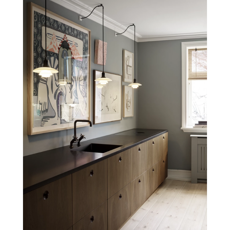 The PH 2/1 Pendant from Louis Poulsen in a kitchen.