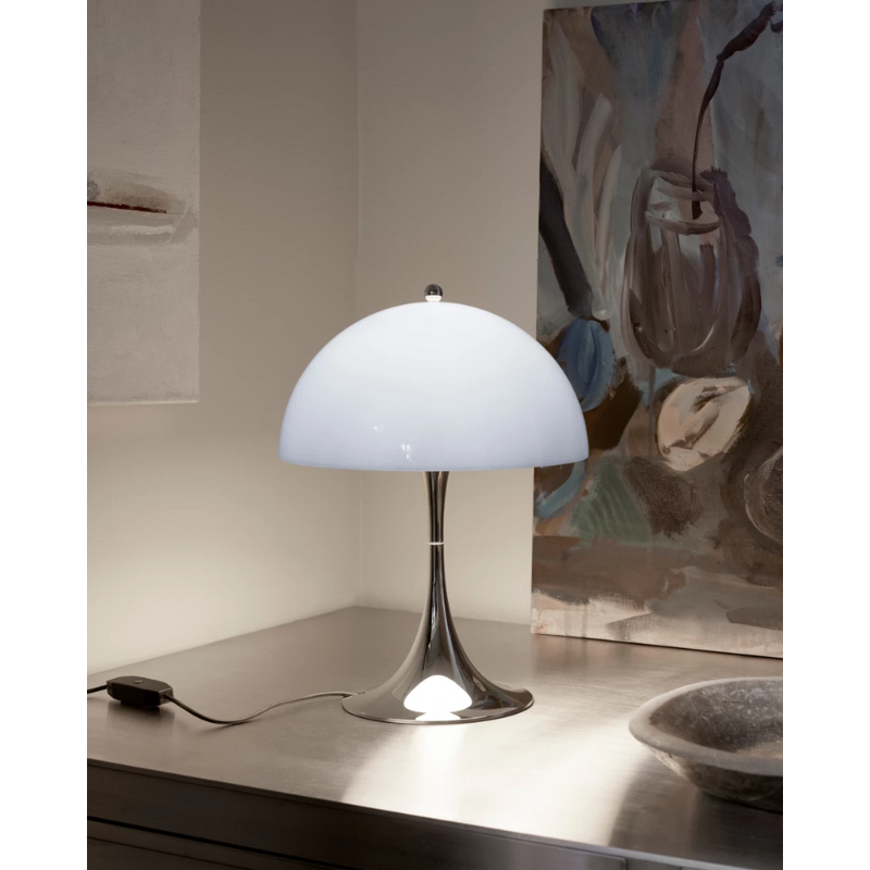 The Panthella Mini Table Lamp is the downscaled version of Verner Panton's classic Pantella Table Lamp created in collaboration with Louis Poulsen in 1971.