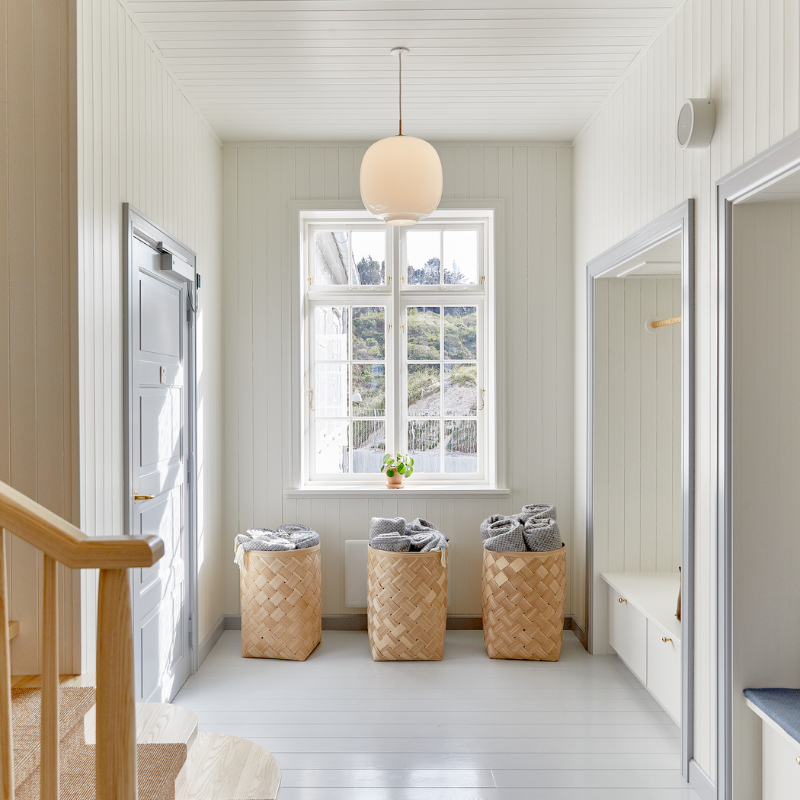 Originally designed in the 1940s by Vilhelm Lauritzen for a project in Copenhagen, the Louis Poulsen VL45 Radiohus Pendant is everything we love about modern design. The lantern shape is smooth and crisply rendered from three layers of hand-blown glass, casting a glowing light from its center that is both functional and beautiful to witness. The glass is topped with a Brushed Brass tube, adding a nice metallic accent to the warmth of the opal glass.