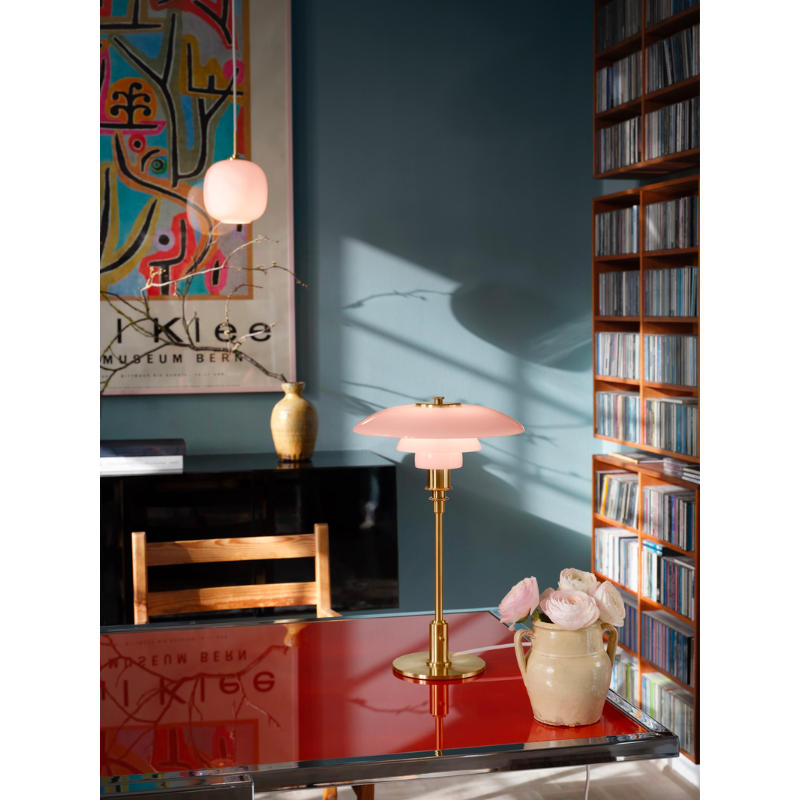 A twist on the iconic design, the VL 45 Pale Rose Pendant features pale rose colored mouth-blown four-layer glass paired with the brushed brass suspension, a subtle nod to contemporary interior trends.