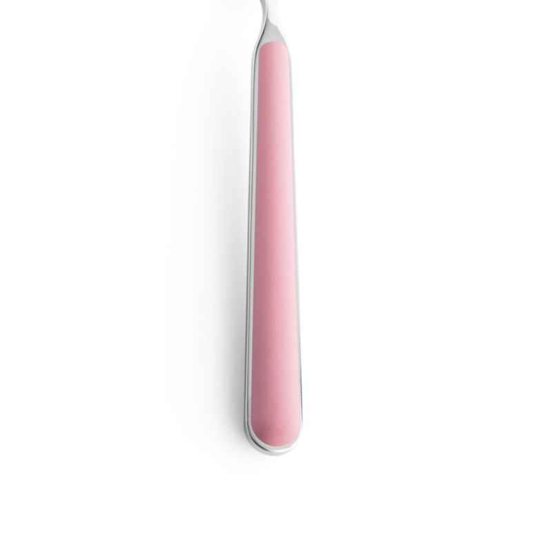 The handle color of the flatware pieces in the Fantasia 36 Piece Cutlery Set from Mepra in pale pink.