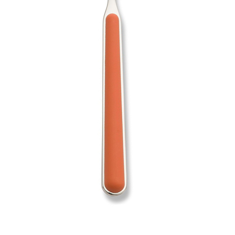 The handle color of the flatware pieces in the Fantasia 36 Piece Cutlery Set from Mepra in rust.