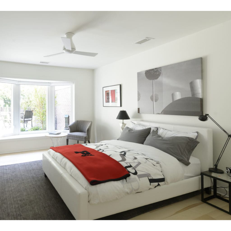 The Altus Flush from The Modern Fan Co. in a decorated bedroom.