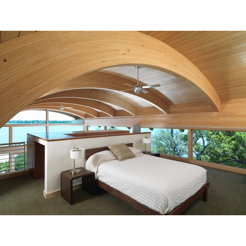 The Ball ceiling fan from Modern Fan Co. with the 42" span in an open space bedroom near a lake.