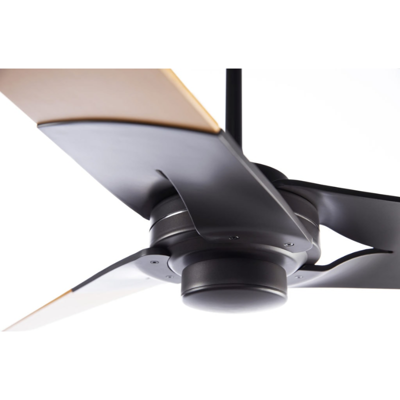 The Torsion - 52" from The Modern Fan Co. in a close up shot showcasing the plywood blades and center.
