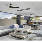The Torsion - 62" from Modern Fan Co. in a outdoor dining space with a lounge and kitchen.