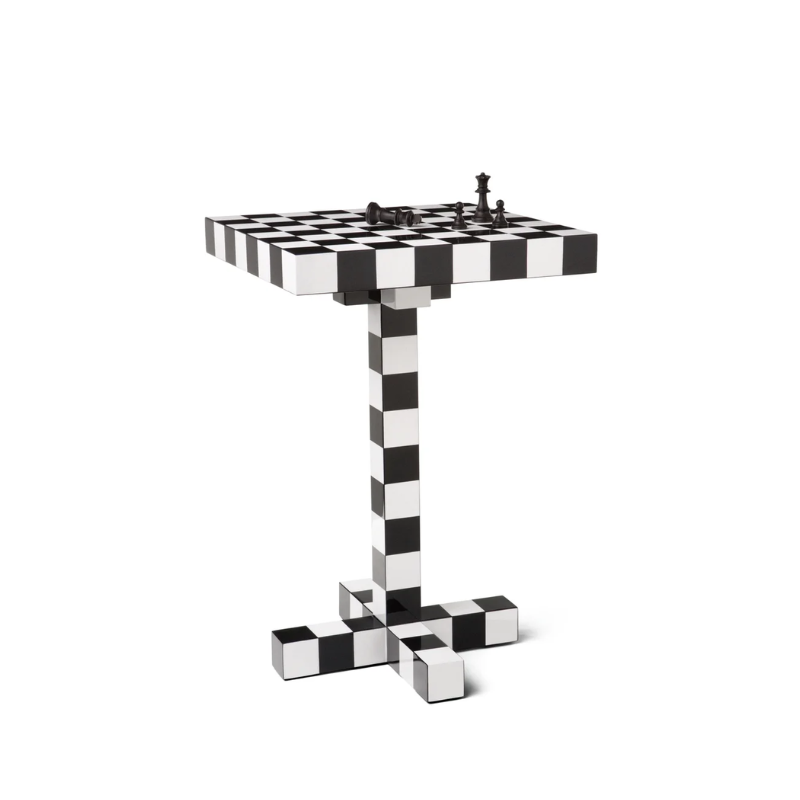 The Chess Table from Moooi with chess pieces on top.