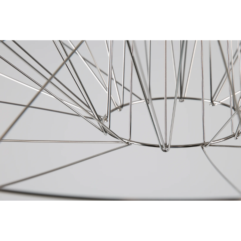 The graceful dance, staged by the three-dimensionally crossed wire structure, leads the spectator to dozens of glowing LED lights, which define the contour and the magical glow of Miyake’s interpretation of a classic chandelier.