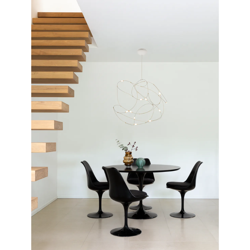 The Flock of Light by Moooi in a family area, above a table.