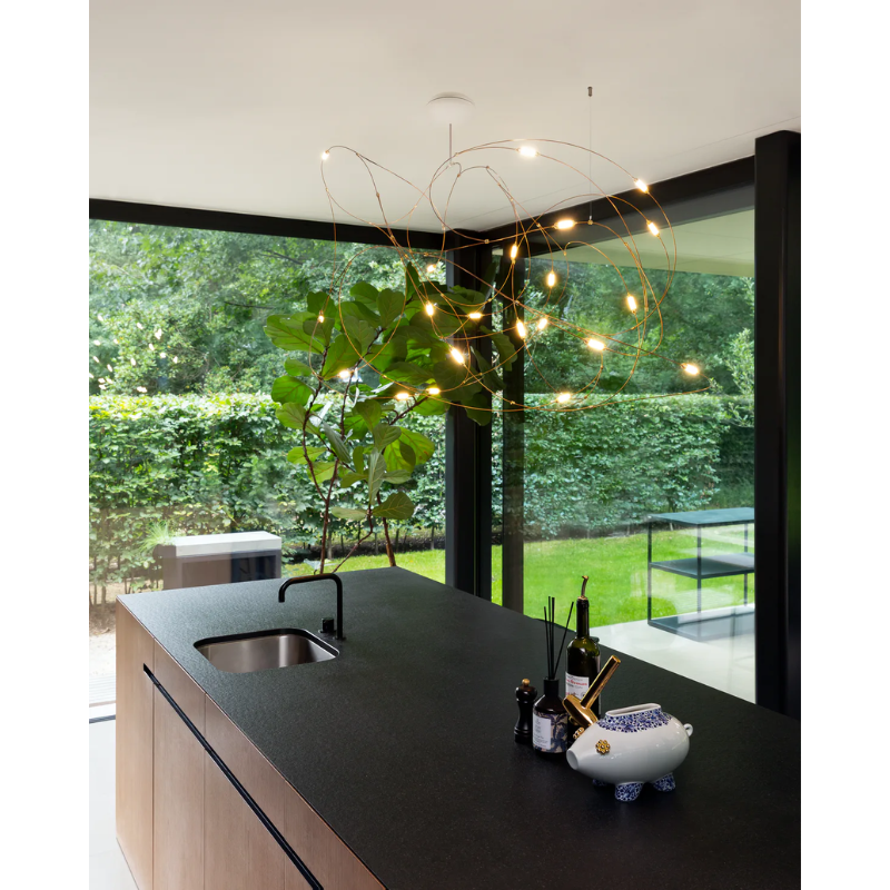 The Flock of Light by Moooi in a kitchen.