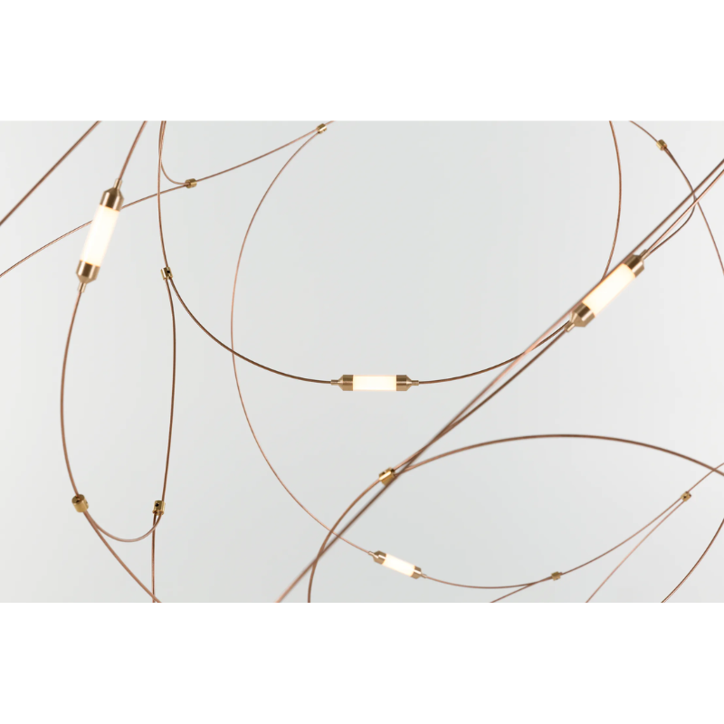 Flock of Light, by Studio Toer, transforms from a light and airy artistic design piece at daytime to a swarm of bright, warm lights at night. A swarm captured in stillness.