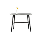 The Woood Desk from Moooi with a decorative vase on top in a lifestyle photograph.