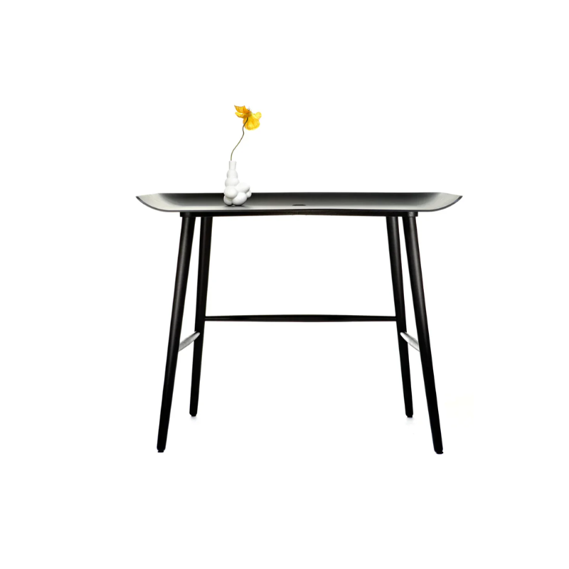 The Woood Desk from Moooi with a decorative vase on top in a lifestyle photograph.