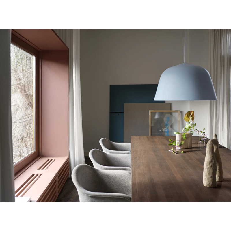 The Ambit Pendant Lamp from Muuto in a dining room.