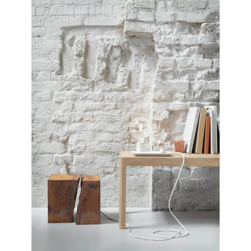 The Control Table Lamp from Muuto in a living space.