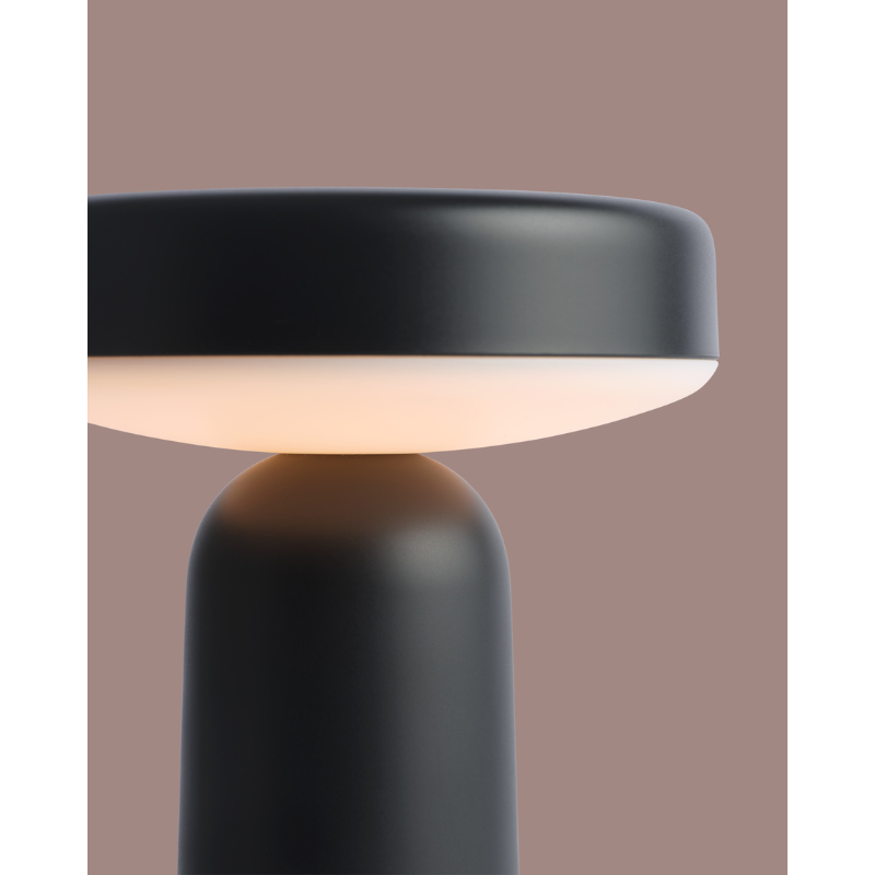 The Ease Portable Lamp from Muuto in a close up lifestyle photograph.