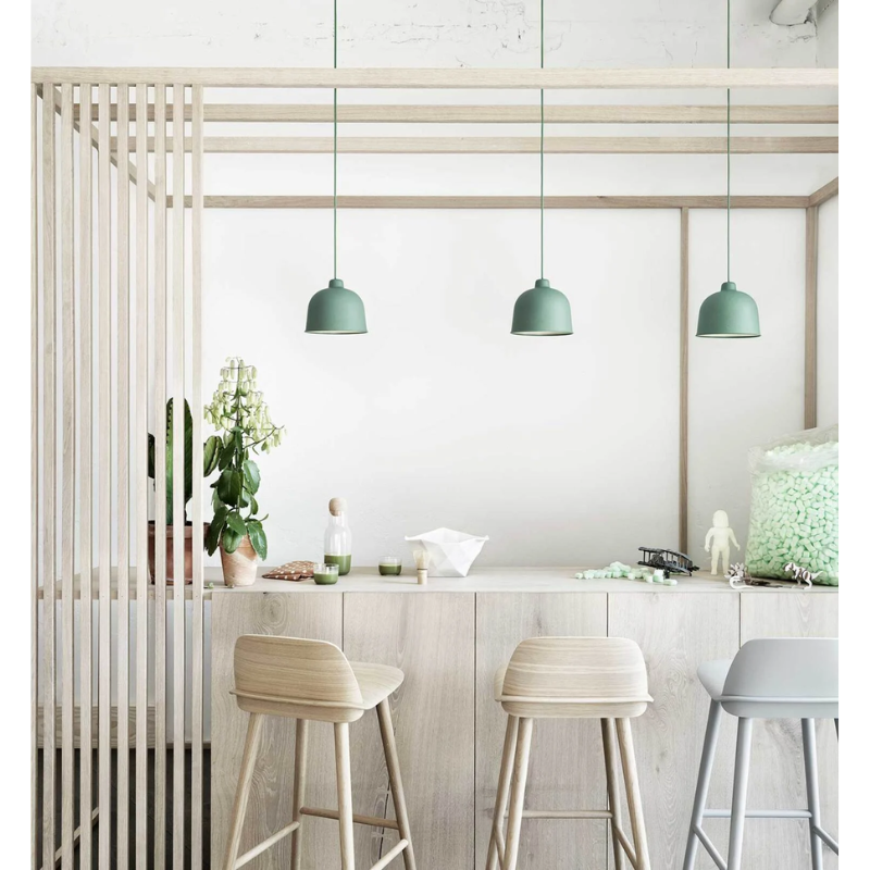 The Grain Pendant Lamp from Muuto in a living room.