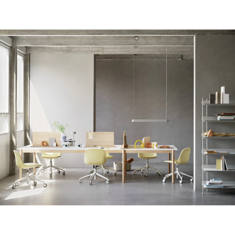 The Linear Pendant Lamp from Muuto in a commercial space.
